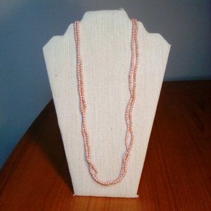 Pair of pink bead stone sphere necklaces
